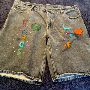 Peace and love painting designed by Stacy. Women Denim Jean short.